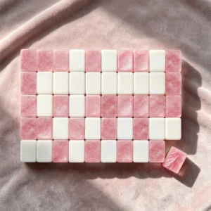 Rosato pink acrylic mahjong tile set featuring a three-layer design, elegant pink and white colours, and premium acrylic craftsmanship