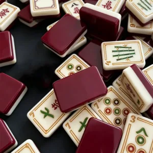 Burgundy Trail Acrylic Mahjong Tile Set showing detailed surface and back design