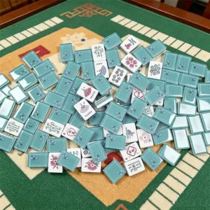 Blue Butterfly Mahjong Tiles with Dice on Table