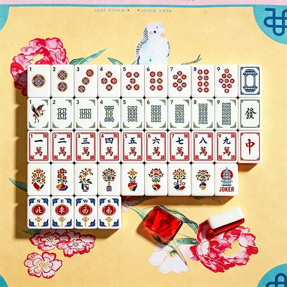 Complete ruby red crane acrylic Mahjong tile set arranged for display