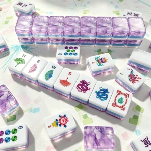 Close-up of purple marble mahjong tiles on table surface