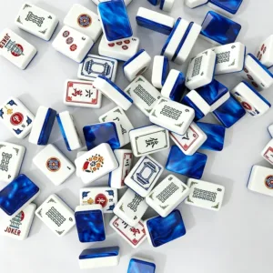 Scattered sapphire blue acrylic mahjong tiles close-up display